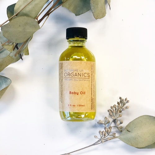 Olio per bambini biologico e delicato Sajishop, bottiglia con etichetta bianca e gialla, ideale per la cura della pelle del neonato
