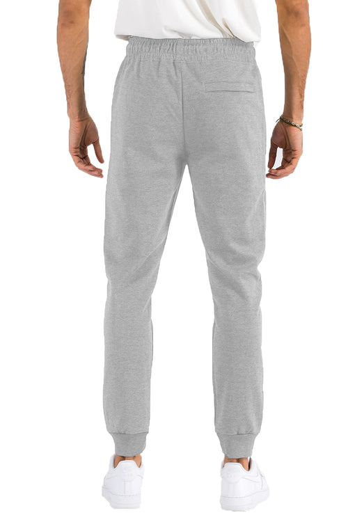 Pantaloni jogger in cotone melange Sajishop, comodi e casual, visibili con dettagli tessuto e cuciture naturali.